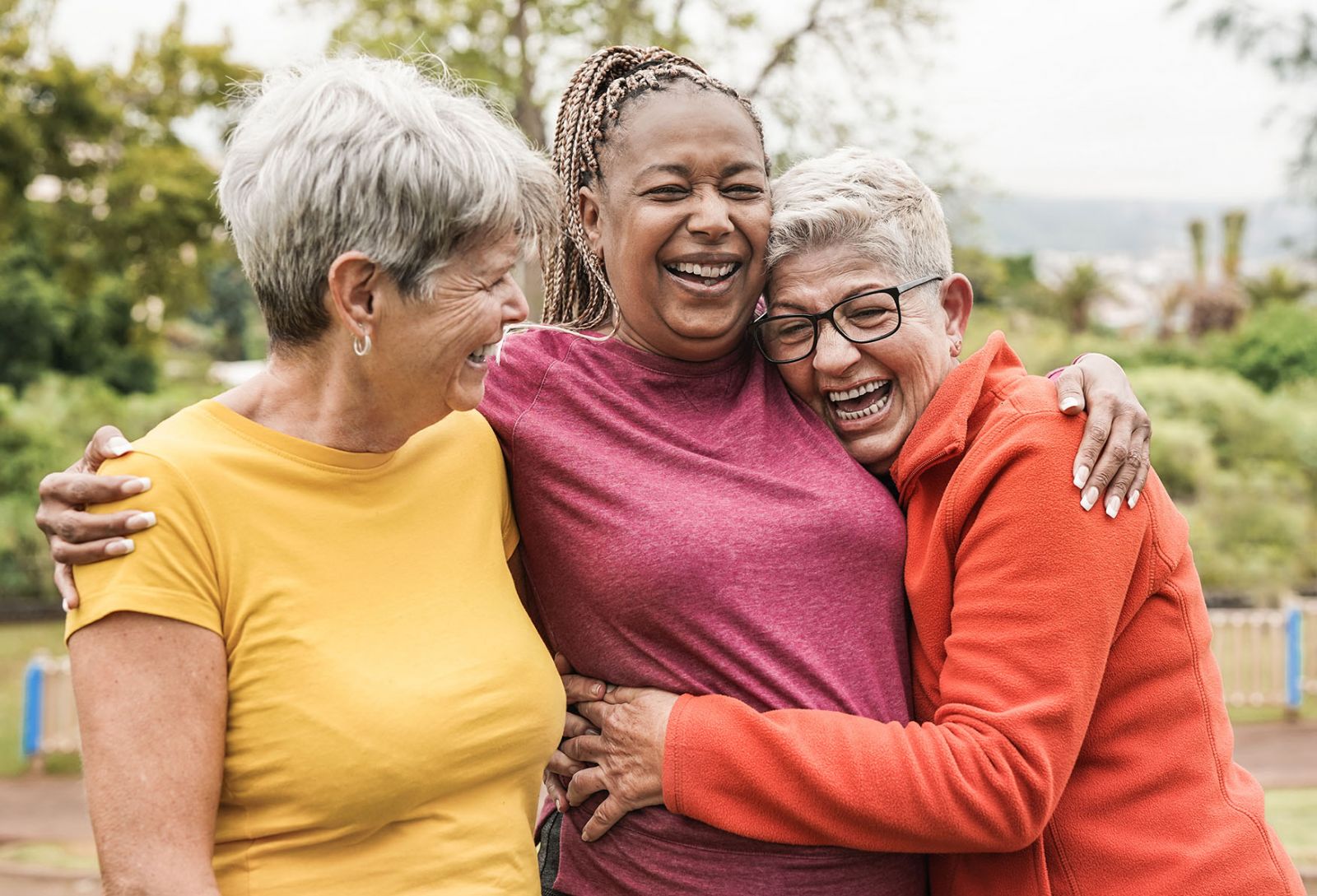 Seniors smiling and having fun in park