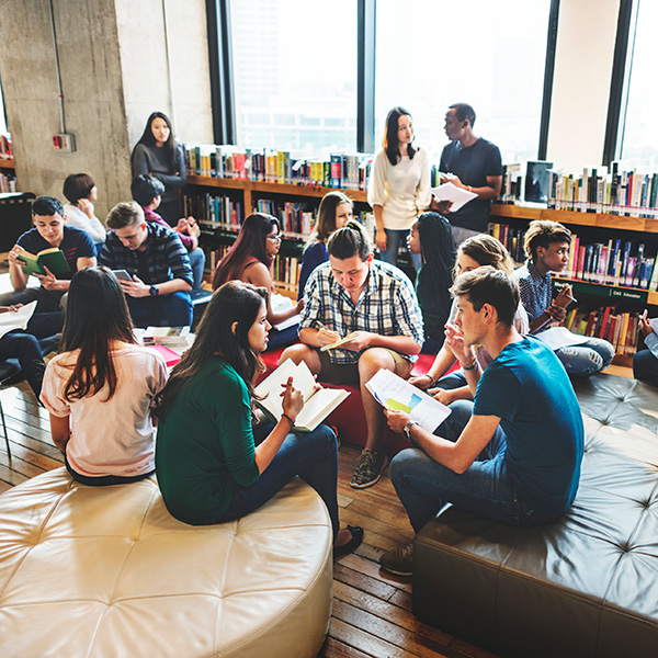 Group of students in library studying